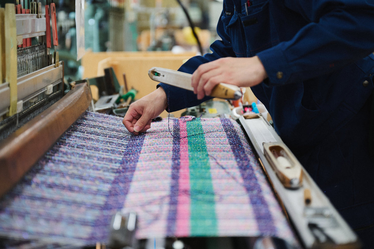 A fabric woven from the accumulation of 