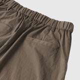 Short "origami" en maille respirante