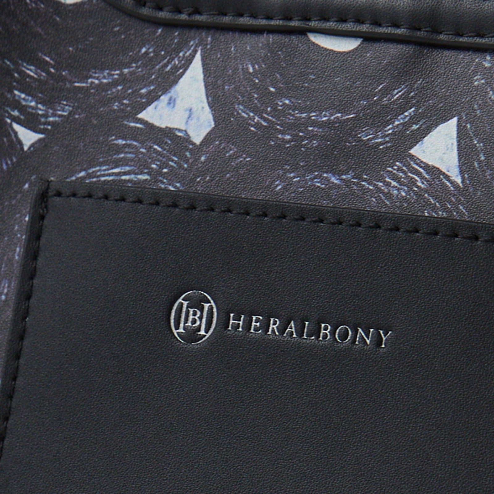 リサイクルレザーバッグ（S）「（無題）（丸）」 – HERALBONY